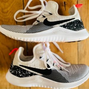 Size 6 Nike Free tennis shoes.